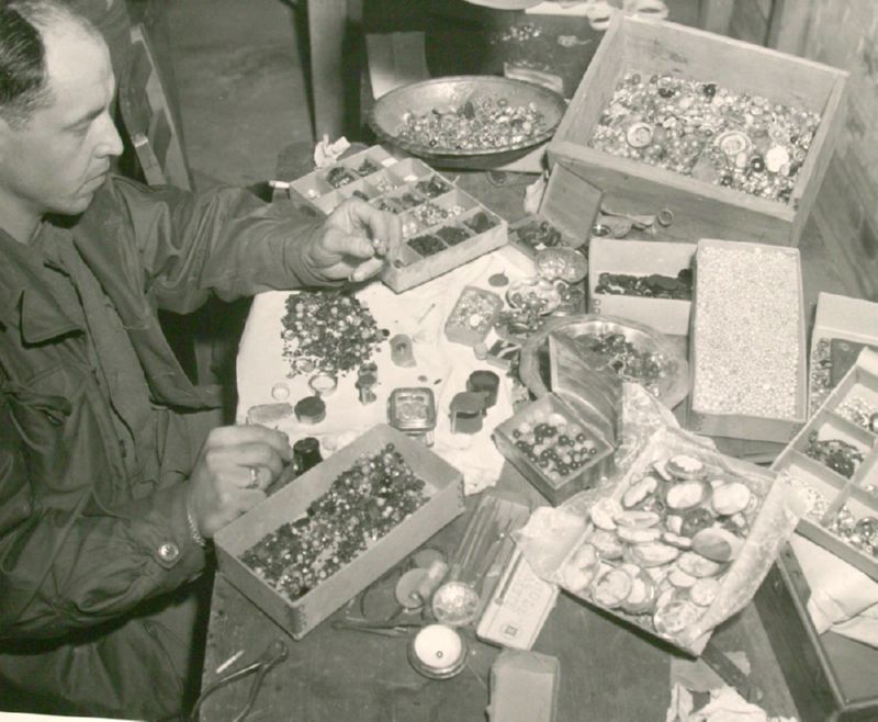 Array of stones and other valuables confiscated from prisoners in the Buchenwald concentration